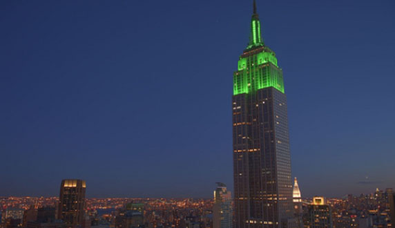 empire-state-building-green-light-night-city-new-york-lights-dark-blue-sky-photo